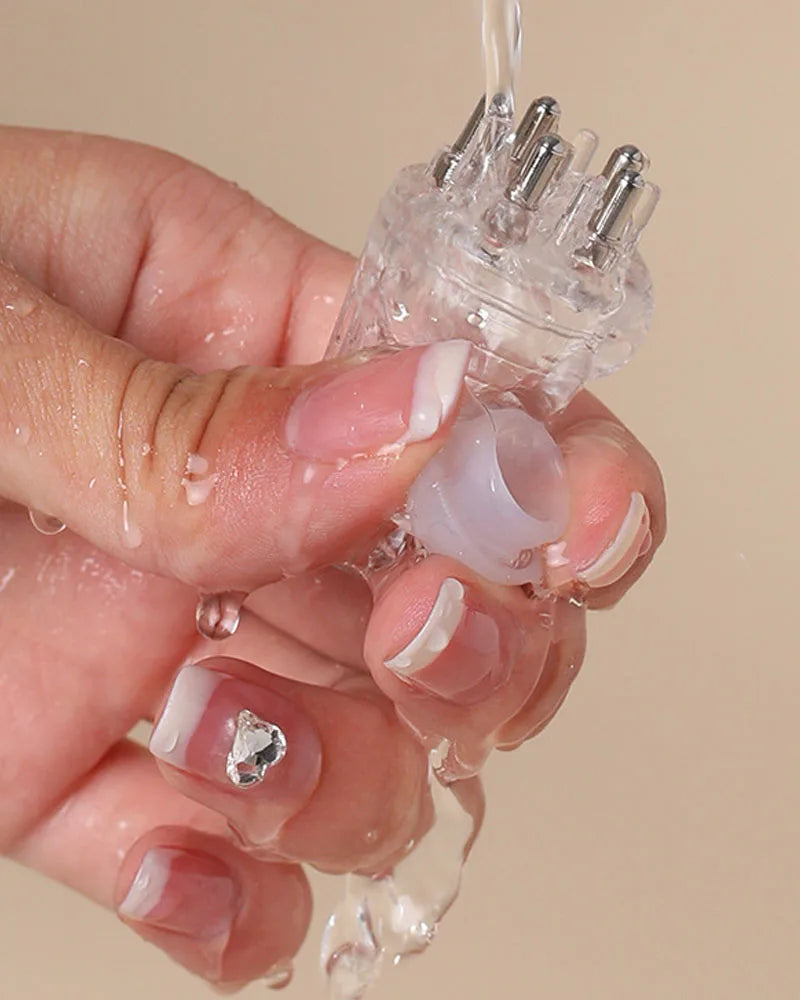 Applicateur d'huile pour cuir chevelu