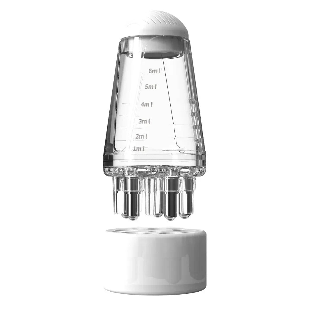 Applicateur d'huile pour cuir chevelu