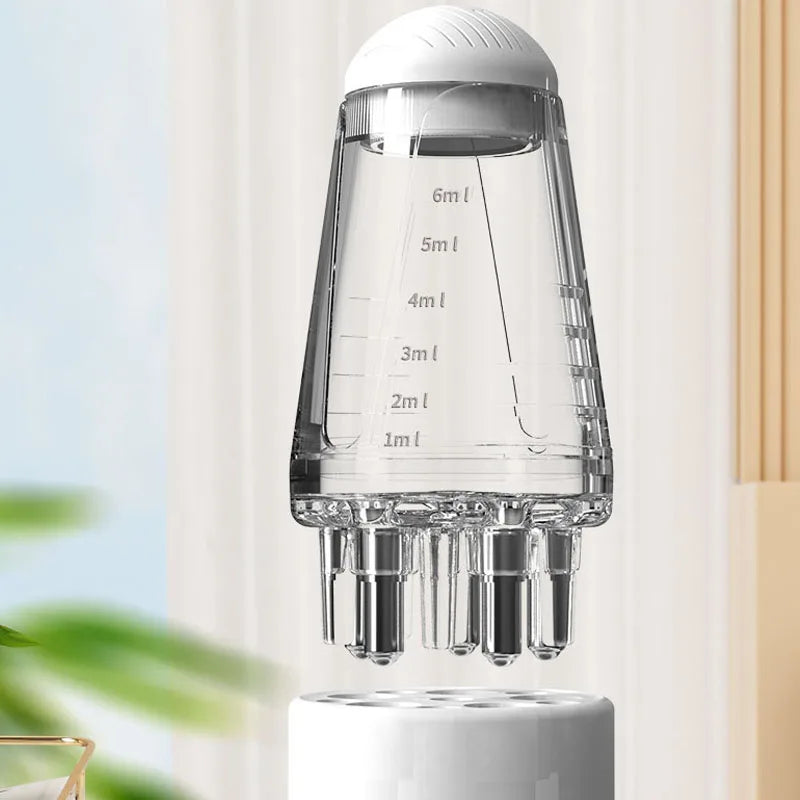 Applicateur d'huile pour cuir chevelu