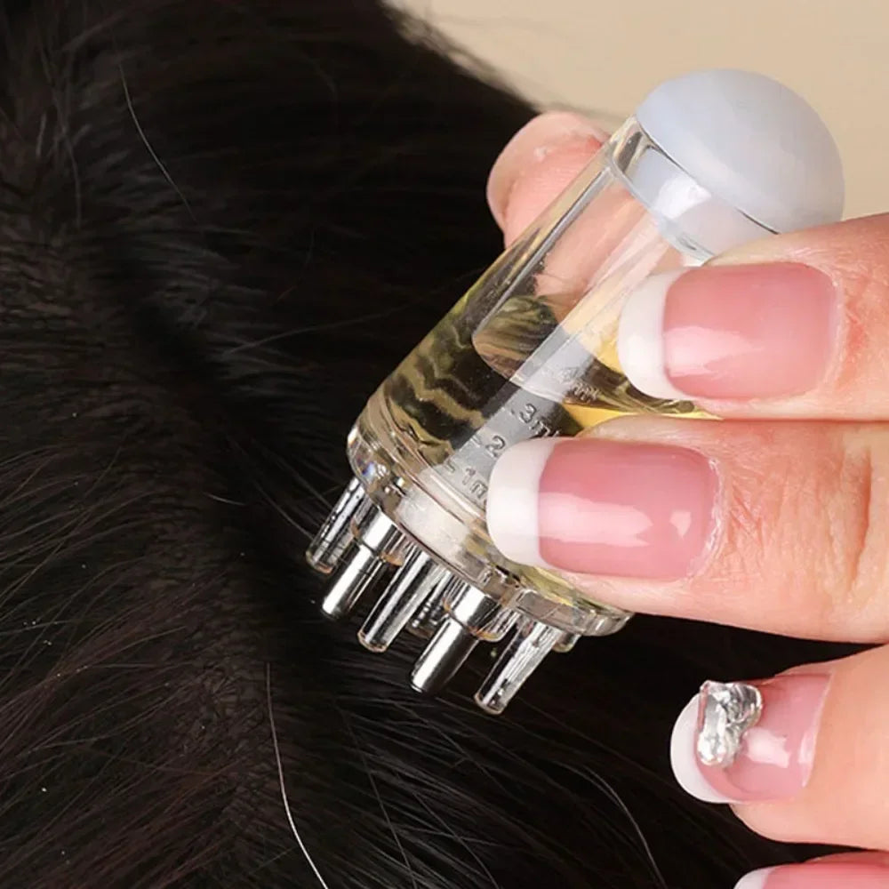 Applicateur d'huile pour cuir chevelu